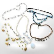 Five necklaces set with synthetic and natural stones, pearl etc.