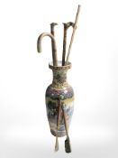 An Oriental porcelain balluster vase, height 61 cm, walking sticks,