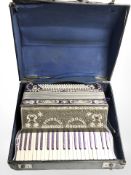 An Italian Special Ficosecco Model C Fidardo piano accordion, in carry case.