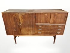 A Danish teak cocktail sideboard, 180 cm x 42 cm x 115 cm.