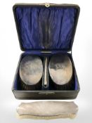 A boxed pair of silver backed dressing table brushes, Birmingham marks,