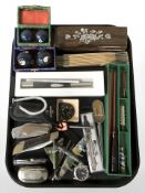 A group of folding pocket knives, Chinese medicine balls, gun cleaning rod, folding rule, etc.