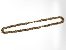A multi strand gold plated necklace, length 39 cm.