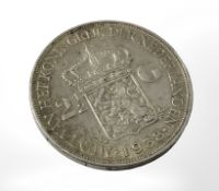 A Dutch 2 1/2 guilder coin, 1938.