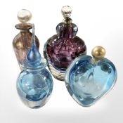Four studio glass scent bottles including an Isle of Wight lustre example,
