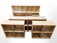 A group of oak / pine open shelves, plus a further small six drawer chest.