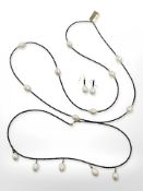 A suite of black spinel and white cultured pearl jewellery, studded in 14ct yellow gold,