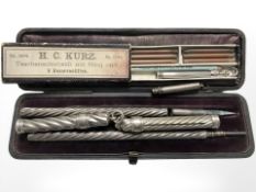 A group of antique silver propelling pencils including a Sampson Mordan example