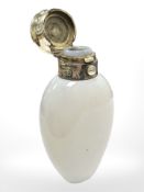 A Victorian opaline glass silver gilt-mounted scent bottle, William Barker, London 1856, height 8.