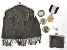 An Art Deco silver plated lady's evening purse, further smaller example,