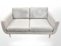 A late 20th century Scandinavian two seater settee in grey fabric,