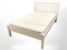 A 4 ft bedframe with John Lewis pocket 1000 mattress.