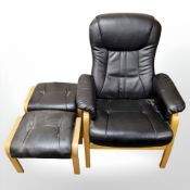 A contemporary Scandinavian bent wood and black stitched leather lounge chair,