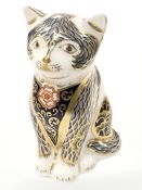 A Royal Crown Derby Fireside Kitten paperweight, with gold stopper,