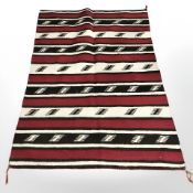An Eastern striped Kilim rug,