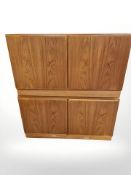 A pair of 20th century Danish teak double door cupboards, each 120 cm wide.