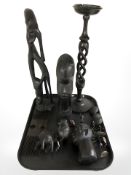 A group of African hard wood busts and figures, comb,
