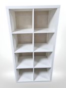 A contemporary open cube bookcase, 76 cm x 39 cm x 147 cm.