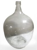 A glass carboy, height 50 cm.