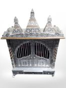 An Indian silvered metal overlaid double door low cabinet,