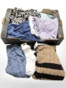 A quantity of lady's clothing, new with tags.