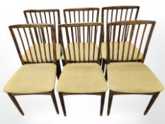 A set of six Danish stained beech spindle back dining chairs.