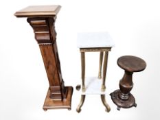 A gilt and white marble pedestal and two further pedestals,