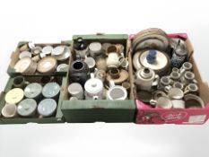 A large quantity of Denby stoneware table wares, kitchen storage jars, etc.