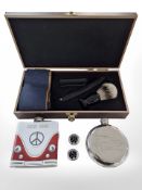 Two contemporary hip flasks and a gent's shaving set