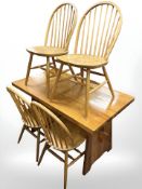 A contemporary pine refectory dining table,