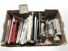 A vintage adding machine, enameled metal meat slicer, scales, etc.