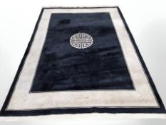 A Chinese carpet on black ground,