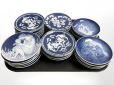 Thirty four Bing & Grondahl / Royal Copenhagen blue and white collector's plates