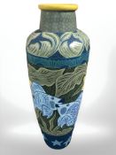 A large contemporary earthenware floor standing vase decorated with fish, height 103 cm,