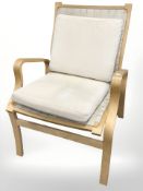 A 20th century Danish bent wood and canvas upholstered lounge chair