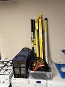 A Tig 200ADC inverter AC/DC welder with mask, torch and several tubes of welding rods.