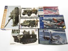 A group of military scale modelling kits including Italeri, Tamiya, etc.