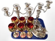 A pair of EPNS three branch candleabra, further plated wares,