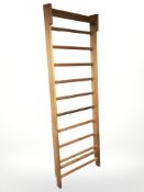 A Scandinavian teak wall rack,
