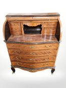 A continental kingwood veneered and satinwood inlaid serpentine front bureau,