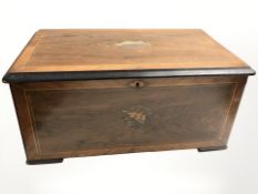 A Victorian inlaid rosewood music box. (empty), width 54 cm.