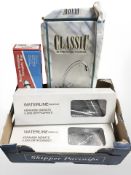 A group of chrome bathroom fittings.