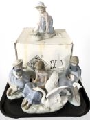 Four various Nao figures of girls, one boxed, tallest 19 cm.