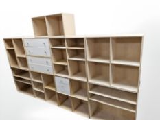 A group of plywood open shelves.