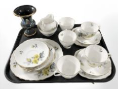 Twenty pieces of Royal Vale floral decorated tea china and a further lustre urn.