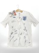 An England Senior Men's Team signed football shirt, with certificate dated 2011,