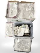 A large quantity of new cushion covers.