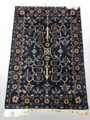 An Iranian rug on indigo ground,