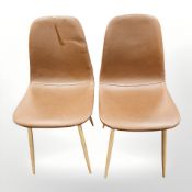 A pair of Jysk stitched brown vinyl dining chairs