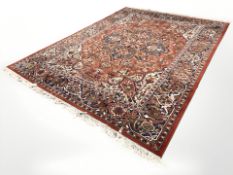 A machine-made carpet of Heriz design,